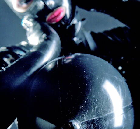 Rubber Tits photo collection featuring juvenile female in female domination fantasy